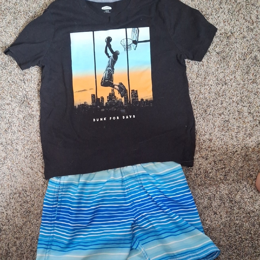 Black graphic Old Navy boys T-shirt, Paired With Blue/white Swim Trunks